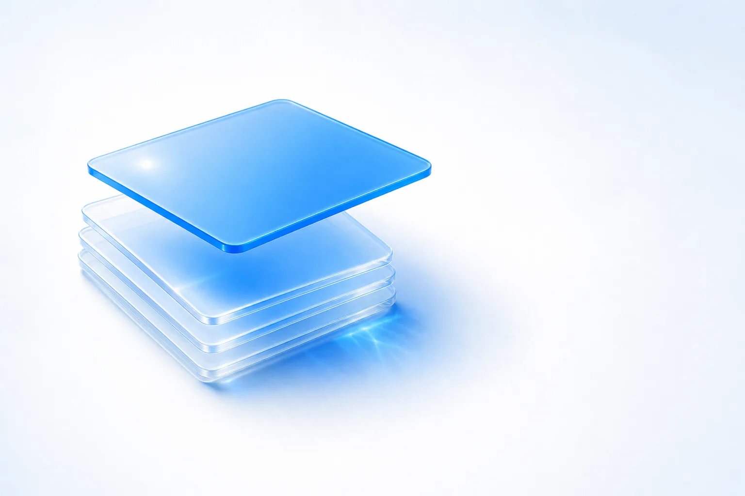 A slightly fanned stack of five flat glass sheets on a white field, the four lower ones clear and colourless, the topmost sheet electric blue and lifted clear of the stack, throwing a concentrated pool of blue light onto the surface beside it.