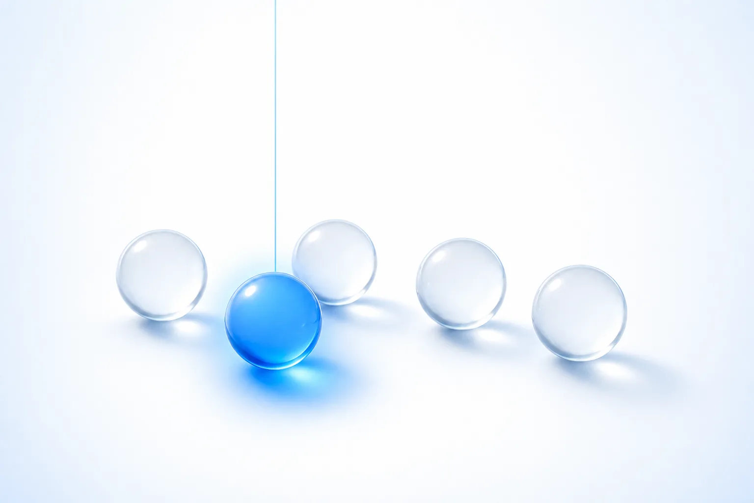 Five glass spheres in a loose arc on a white field, four of them clear and inert, one lit from within in electric blue and sending a single fine thread of light up out of the frame.